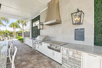 A patio with grilling stations